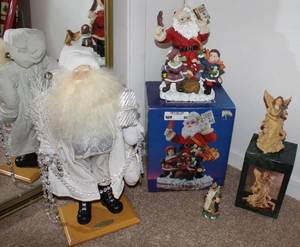 lot 86 image: Christmas Figurine Lot Three Santas and One Angel
