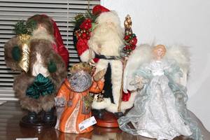 lot 95 image: Three Santas and an Angel Tree Topper