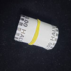 lot 60 image: Unsearched Bank Rolls of Half Dollars