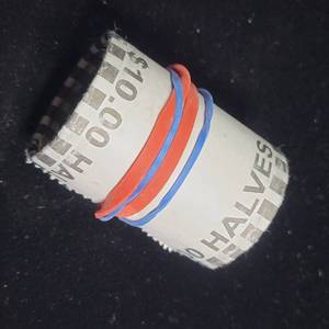 lot 134 image: Unsearched Bank Rolls of Half Dollars