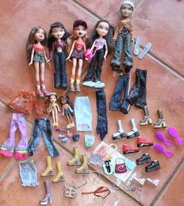 lot 155 image: Lot Of Collectible Bratz Dolls and Clothes, Including a Bratz Boy