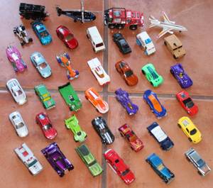lot 154 image: Lot of Toy Cars Including Hotwheels 1969 Chevy Nomad and 1994 Matchbox Army Vehicle (Before It Was Bought By Matel)