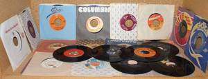 lot 159 image: Lot of 30 Vintage 45 RPM Records Including Waylon Jennings, Elvis Presley Dont be Cruel, and Johnny Paycheck Take This Job and Shove It