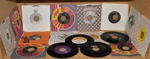 lot 153 image: Lot of 17 Vintage 45 RPM Records Including The Beatles, Dean Martin, The Judds, and The Oak Ridge Boys
