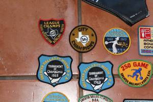 lot 183 image: Tennis Racquets, Racquet Ball In a Can, and Vintage 1960s Bowling Patches