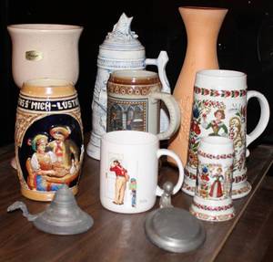 lot 173 image: Lot of vintage Beer Steins, a Goblet, Clay Wine Pitcher,and Norman Rockwell Coffee Mug