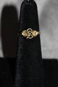 lot 203 image: 18K Gold Ring Size 5.5 With Missing Stone and Unknown Clear Stones