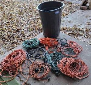 lot 242 image: Trash Can Filled With Extension Cords