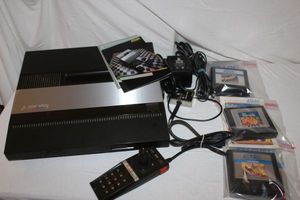 lot 28 image: Atari 5200 and Three Games