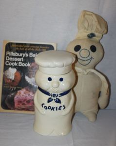 lot 16 image: Pillsbury Dough Boy Cookie Jar, Pilsbury cookbook and Stuffed Dough Boy