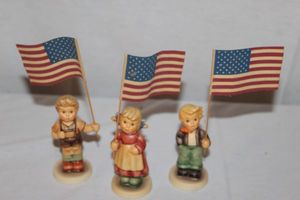 lot 20 image: Hummels Little Flag Bearer 239, Miss Patriot, Pledge to America