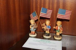 lot 26 image: Hummels Little Flag Bearer, A Salute to the USA, Freedom Day