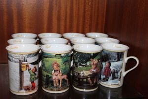 lot 30 image: Twelve Months of Hummel Mugs