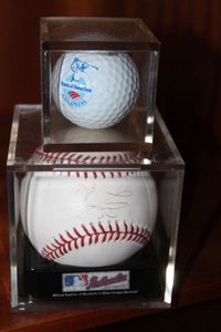 lot 43 image: Autographed Baseball, and colonial golf ball