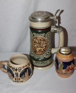 lot 47 image: Vintage Avon Stien Gerz German Castle Mug, and 1950s Gerz beer stien Table Lighter