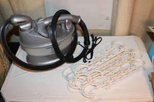 lot 63 image: Conair Steam Iron and Closet Accessies