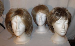 lot 68 image: Three Stylish Wigs as Shown