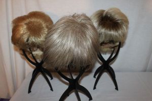 lot 69 image: Three Stylish Wigs as Shown
