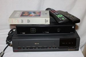 lot 111 image: Verizon TV Box and Magnavox VCR with Star Trek VHS Set