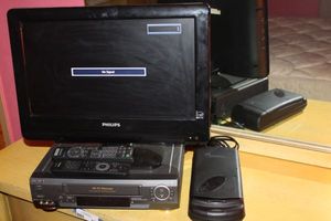 lot 277 image: Television with VHS Player