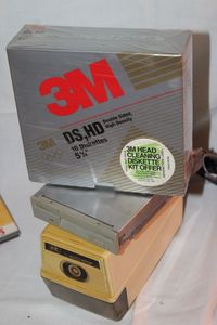 lot 293 image: Pencil Sharpener floppy drive and discs