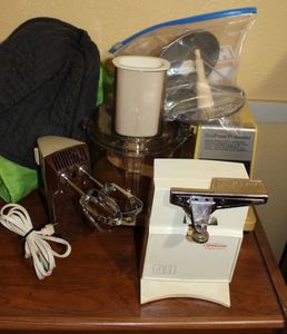 lot 121 image: Small Kitchen Appliances, Can opener, hand mixer and Food processor with covers