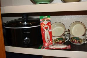 lot 133 image: Crockpot and Tabasco Bowls and bottle openers