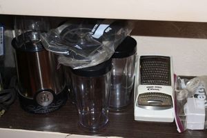 lot 142 image: Magic bullet type appliance and electric grater