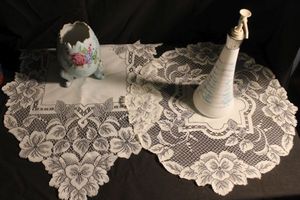 lot 326 image: Vintage Jergens Lotion Bottle and Ceramic Egg with Doilies