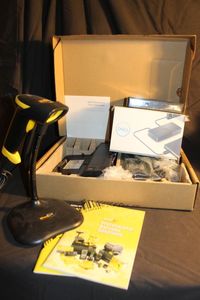 lot 415 image: Dell Docking Station and Product Scanner
