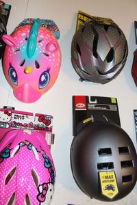 lot 527 image: Four bike safety helmets