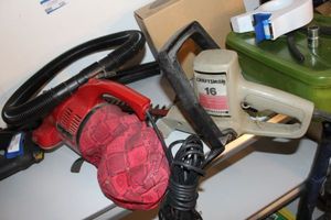 lot 576 image: Dirt Devil vacuum (it sucks) and craftsman Hedge Trimmers