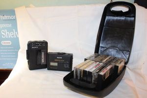 lot 451 image: Case of Cassettes and Sony Walkman