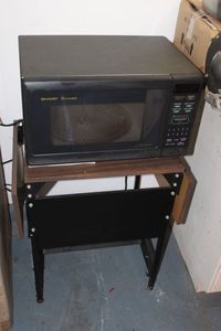 lot 597 image: Microwave stand with shelf and cabinet