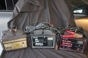 lot 616 image: Three Generations of Sears Battery Chargers