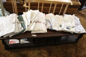 lot 635 image: Approximately 30 T Shirts in a Variety of Sizes and Logos
