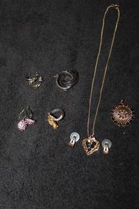 lot 377 image: Jewelry Gold Necklace with Heart Pendant, Additional Pendant, Four Pairs of Earring and One Ring