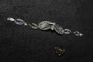 lot 380 image: Jewelry Bracelet and Ring, Bracelet Stamped 925