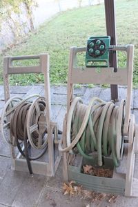 lot 654 image: Two Garden Hose reels, Hoses and attachments
