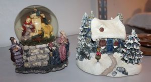 lot 32 image: Vintage Nativity Snow Globe and Thomas Kinkade Stoneheart Hutch Light Up Christmas Dcor