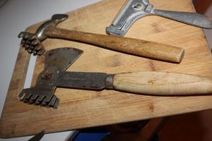 lot 36 image: 2 Antique Iron Meat Tenderizer Butcher Hammer, Mallet and a Vintage Trevco Cheese Slicer