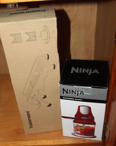 lot 40 image: Ninja Express Chop In Original Box and Tupperware Slicer in Original Box