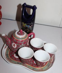lot 70 image: Vintage Chinese Famille Rose man shou Longevity Teapot and Cups,