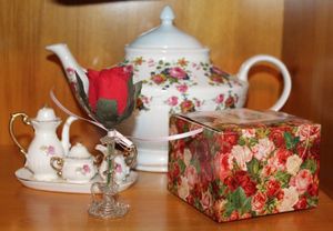 lot 83 image: Ceramic Teapot with Rose,Miniture White with Pink Roses Teapot sugar and creamer, Hand Blown Crystal Vase with Rose Bud and Rose patterned Note Paper