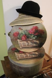 lot 165 image: Two Nesting Boxes and Two hats