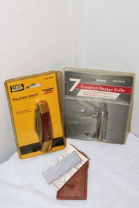 lot 202 image: Unused SIP Pocket knives