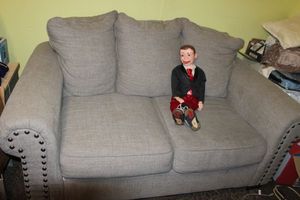 lot 200 image: Solid grey Love Seat CHARLIE NOT INCLUDED&nbsp