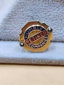 lot 74 image: 14-kt gold Humble Companies Retired pinback
