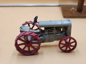 lot 49 image: Vintage Fordson cast iron toy tractor