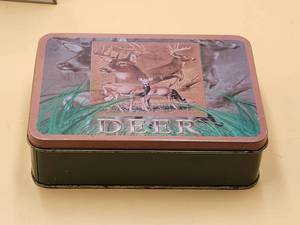 lot 43 image: Collectible knife in tin box